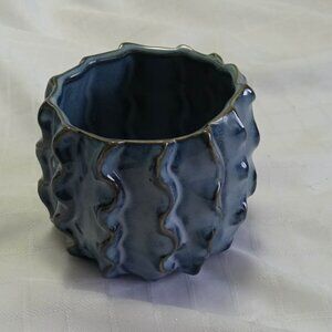 Glazed ceramic planter with a glossy finish Studio-style shades of blue and gray